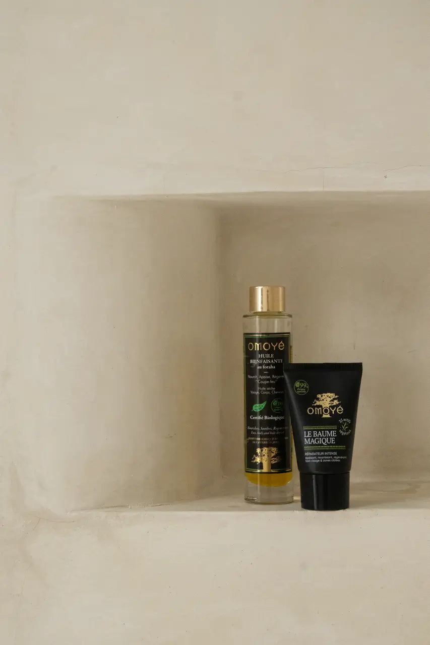 Baume réparateur et huile réparatrice pour le corps, cheveux et visage pour l'été.