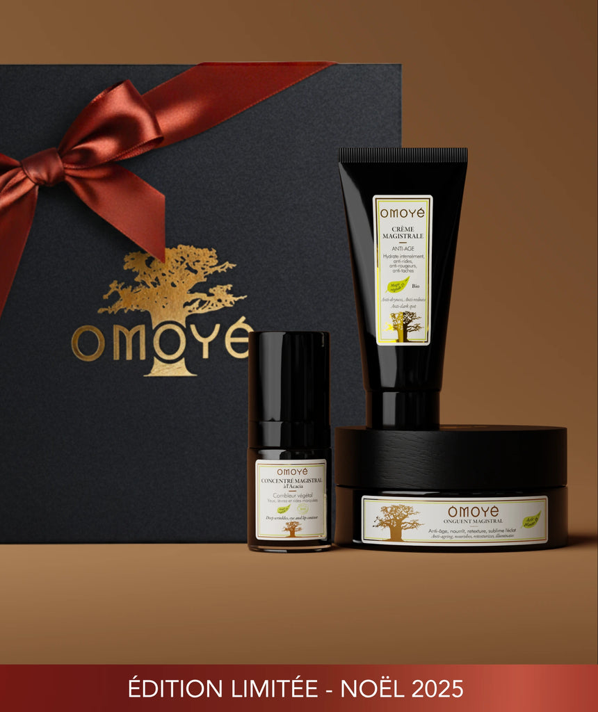 Coffret Magistral Omoyé en édition limitée Noël 2025. Rituel anti-âge intensif associant crème magistrale, concentré magistral et onguent magistral. Formules naturelles inspirées de la pharmacopée d’Afrique pour hydrater, lisser et raffermir la peau.